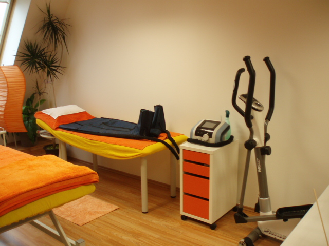 Treatment room with Lymphastim pressotherapy garment and BTL device